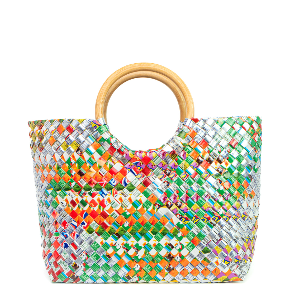 In color online.] Handmade designer's bags from recycled materials